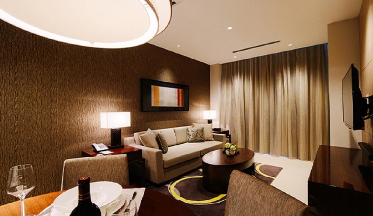 Отель Oakwood Premier Токио Экстерьер фото A living room