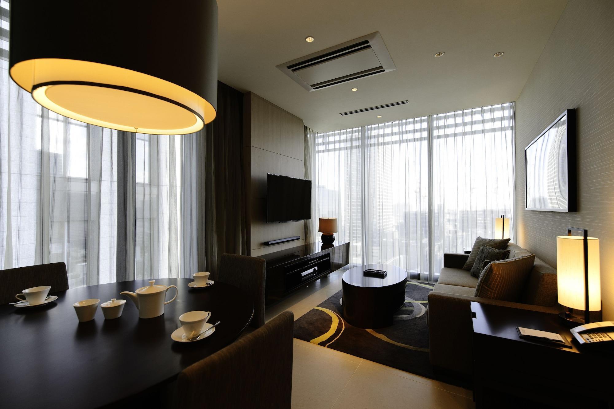 Отель Oakwood Premier Токио Экстерьер фото A suite at the hotel