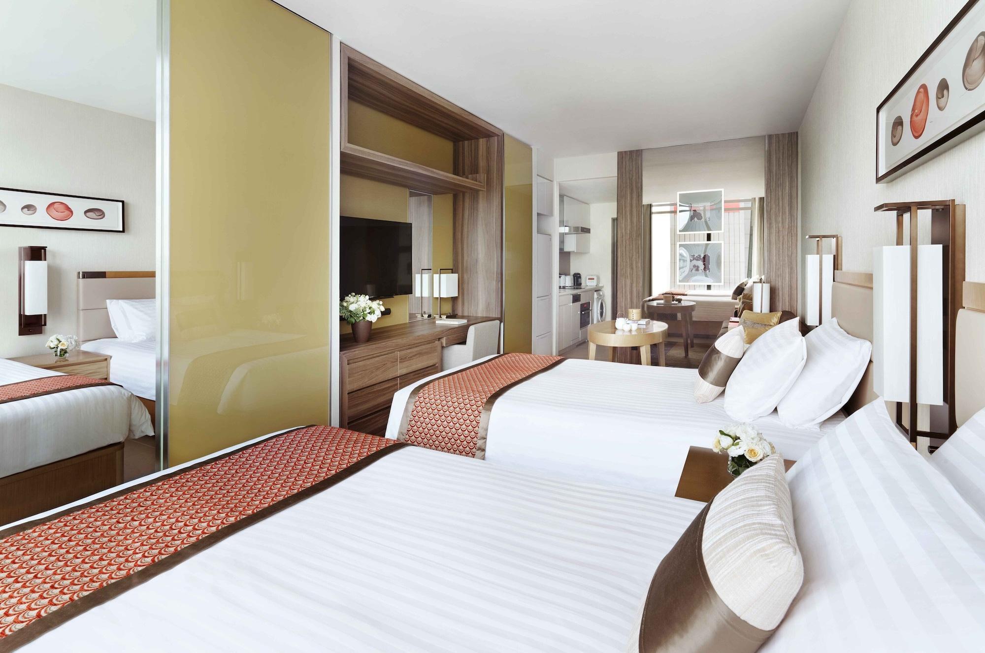 Отель Oakwood Premier Токио Экстерьер фото A typical room at the hotel