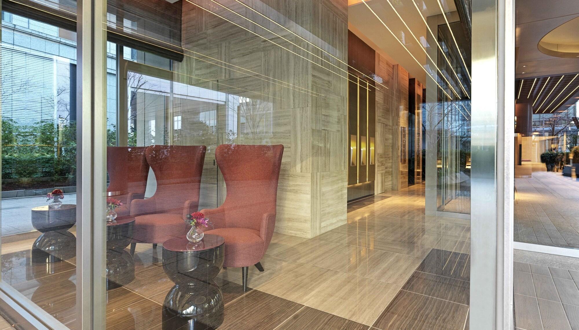 Отель Oakwood Premier Токио Экстерьер фото Lobby