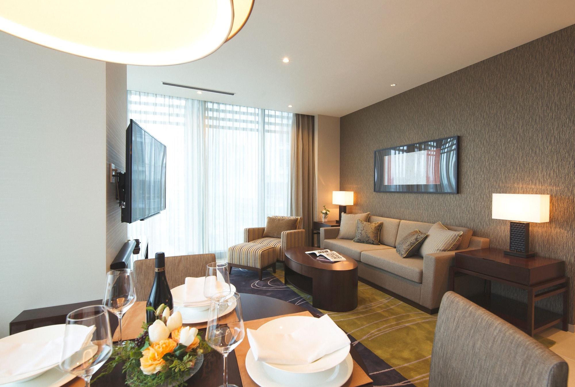 Отель Oakwood Premier Токио Экстерьер фото A living room at the hotel