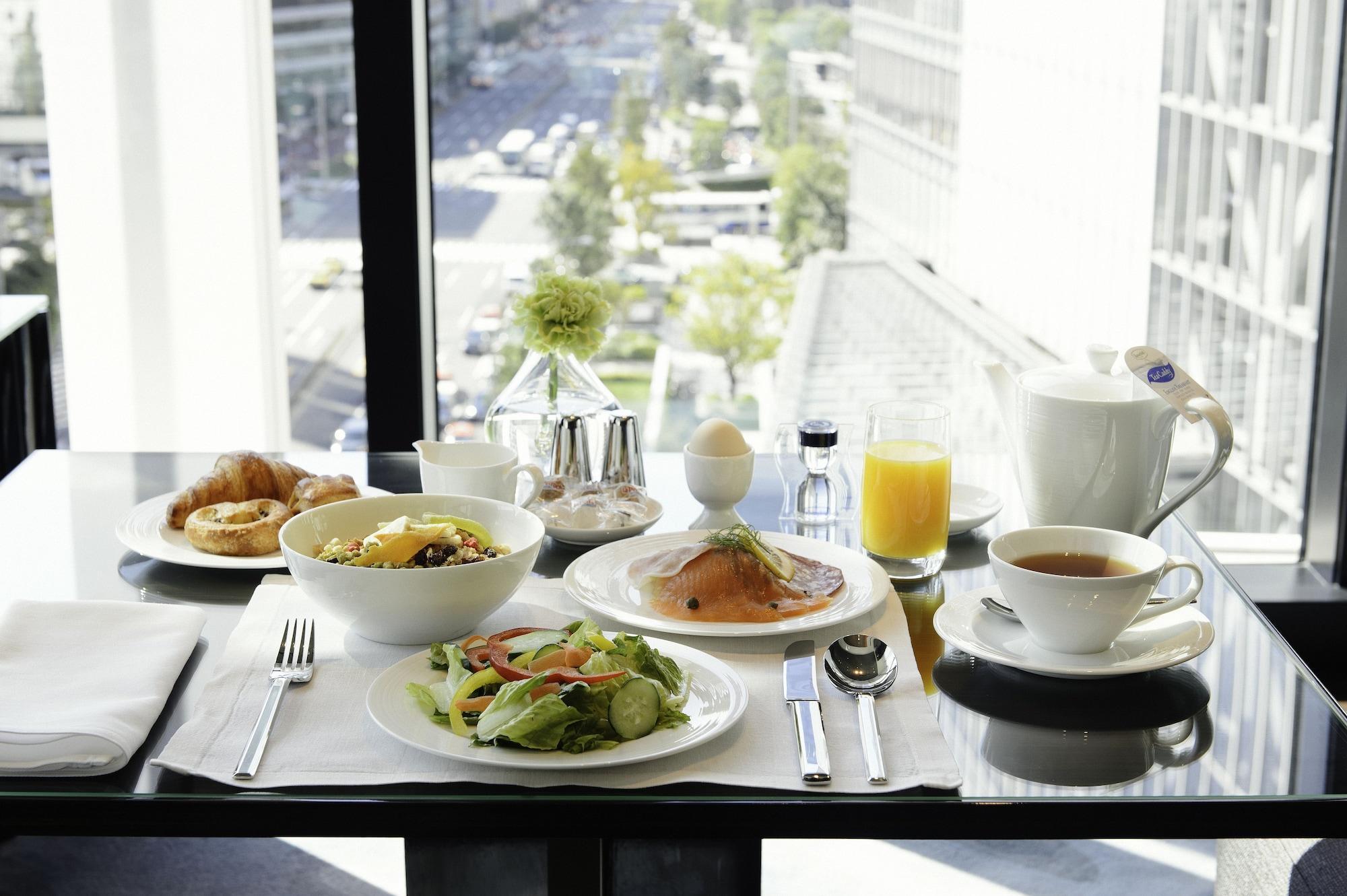 Отель Oakwood Premier Токио Экстерьер фото A breakfast table